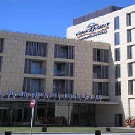 Howard Johnson Plaza Lingang Shanghai Nanhui Exterior photo