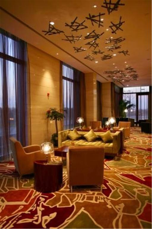 Howard Johnson Plaza Lingang Shanghai Nanhui Exterior photo