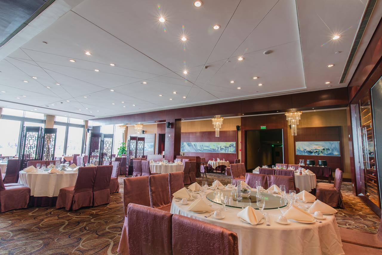 Howard Johnson Plaza Lingang Shanghai Nanhui Exterior photo