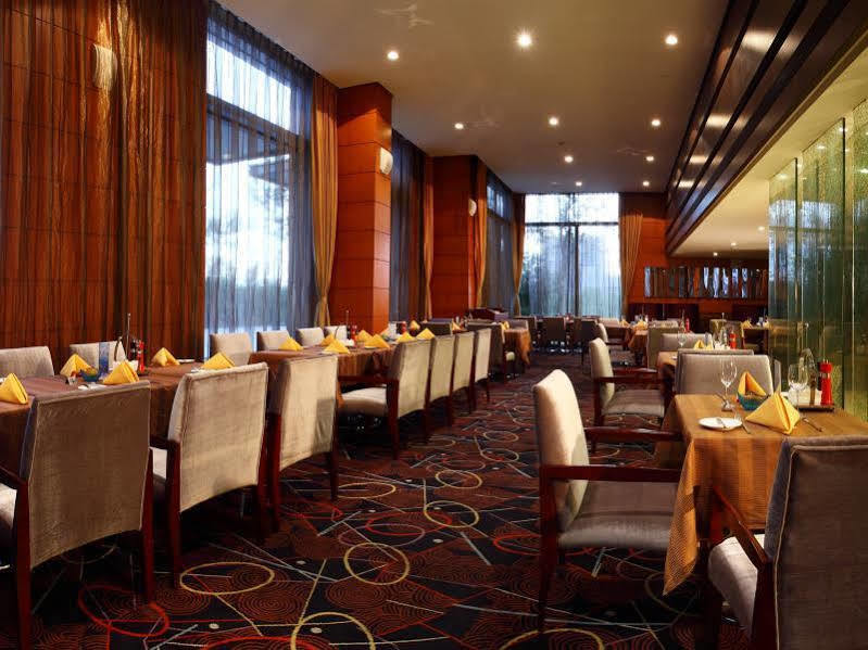 Howard Johnson Plaza Lingang Shanghai Nanhui Exterior photo